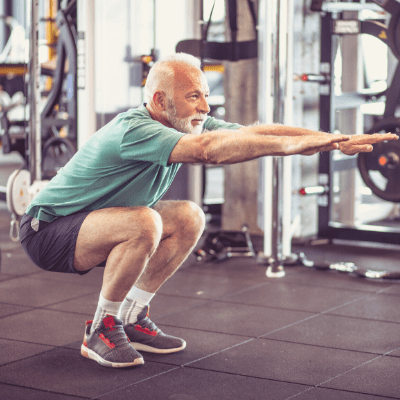 senior man working out at the gym