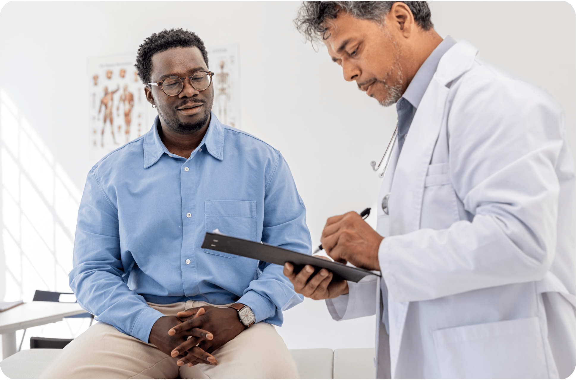A man and his doctor chatting in a medical office