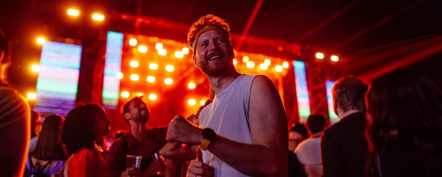 Man enjoying concert symbolizing courage and confidence NorthShore
