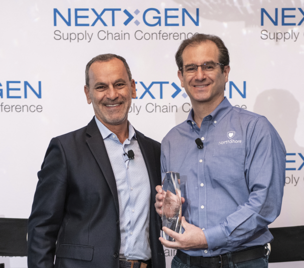 Adam, CEO & Founder of NorthShore, is presented with the 2022 NextGen End-User Award by Abe Eshkenazi, CEO of Association for Supply Chain Management 
