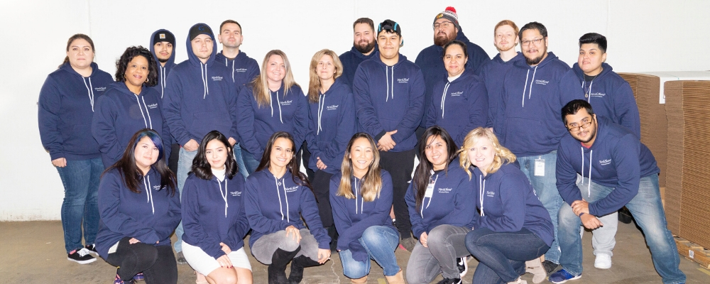 A group of NorthShore staff wearing #EndHealthStigma hoodies