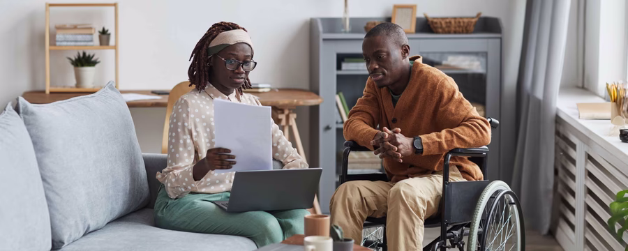woman reviewing documents with loved one