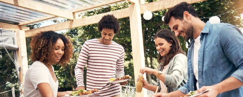 Friends having summer cookout