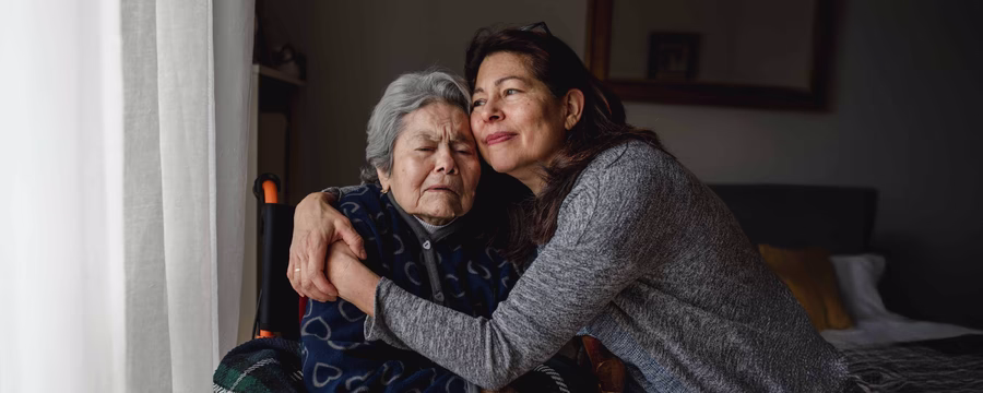 a caregivers embrace with the one their caring for
