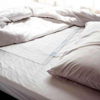 NorthShore’s MagicSorb Air Underpads on bed