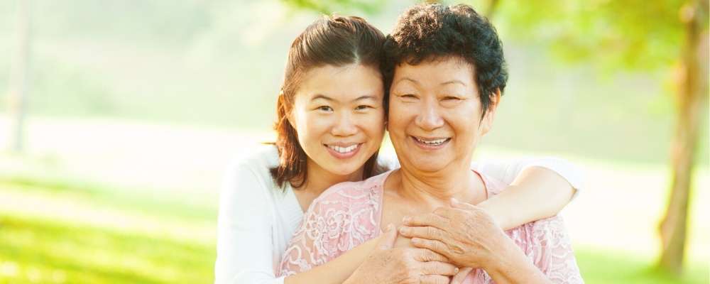 mother and daughter hugging