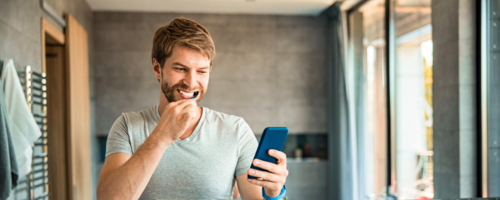 man with ibs looking for diapers on mobile phone