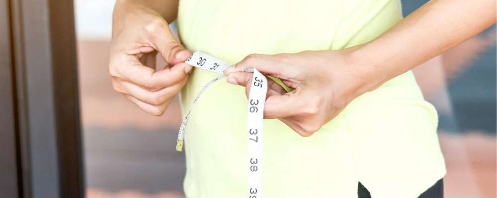 Measuring tape around waist