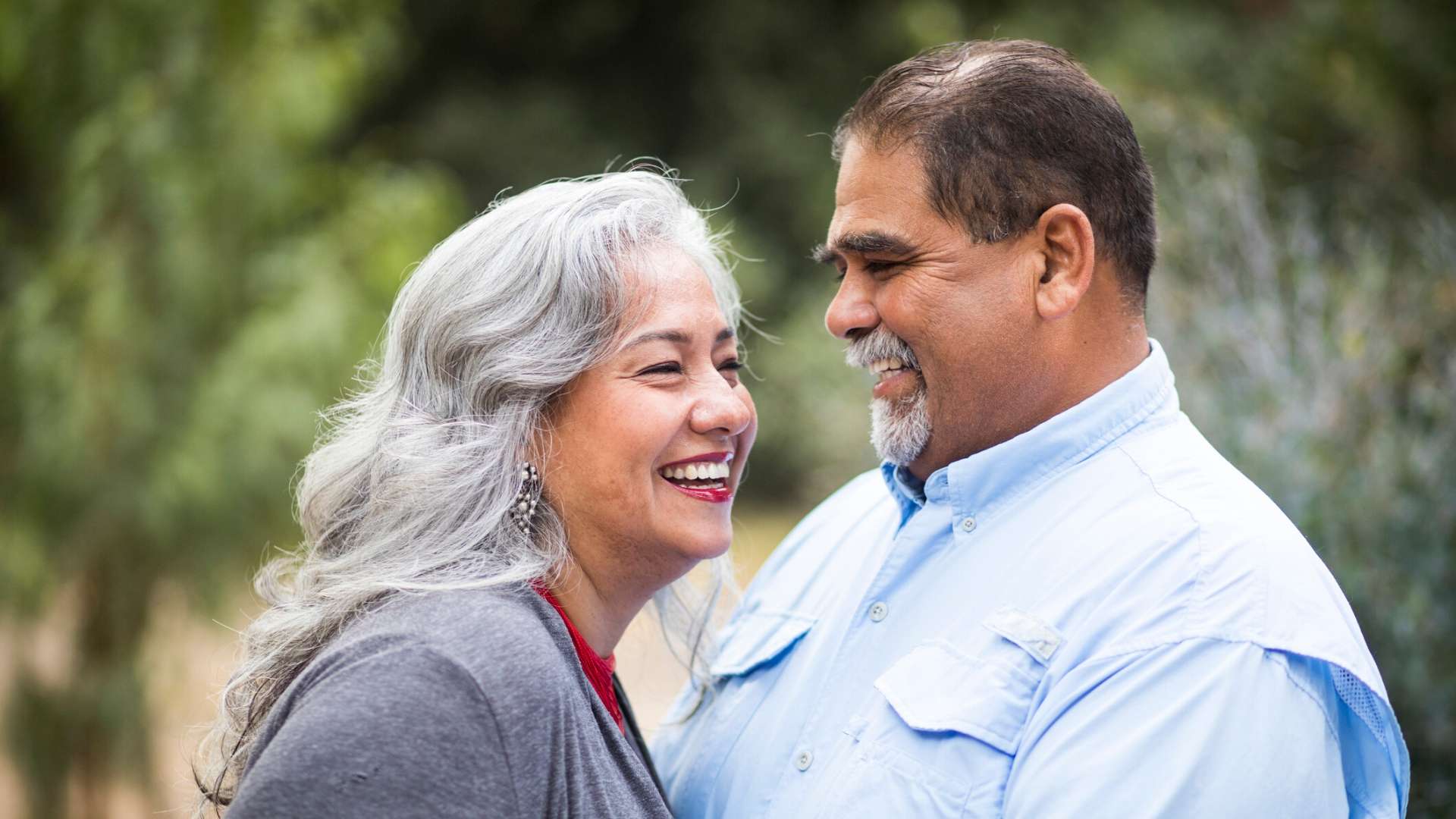 Plus sized couple smiling 