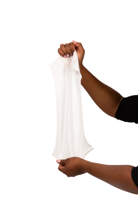 Hands stretching a NorthShore Supreme Quilted Wipe to show its large size, strength, and durability for personal cleansing.