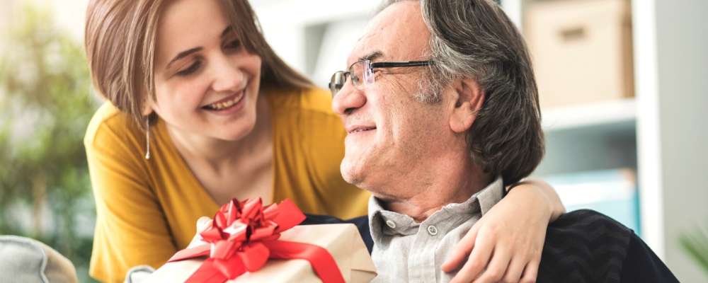 Young girl giving gift