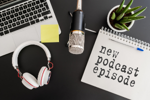 Image of plant, microphone and headphones